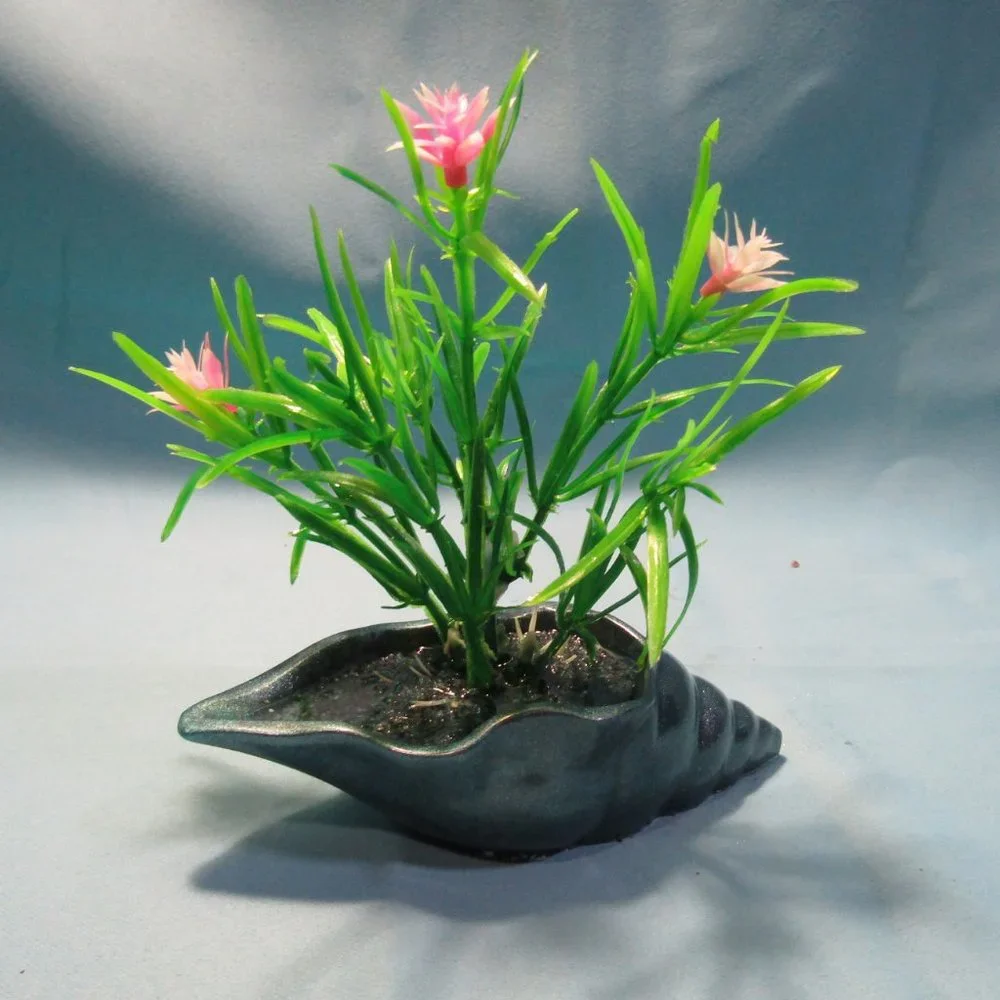 Aquarium Decoration -Teal Blue Long Shell with Flowering Plant.